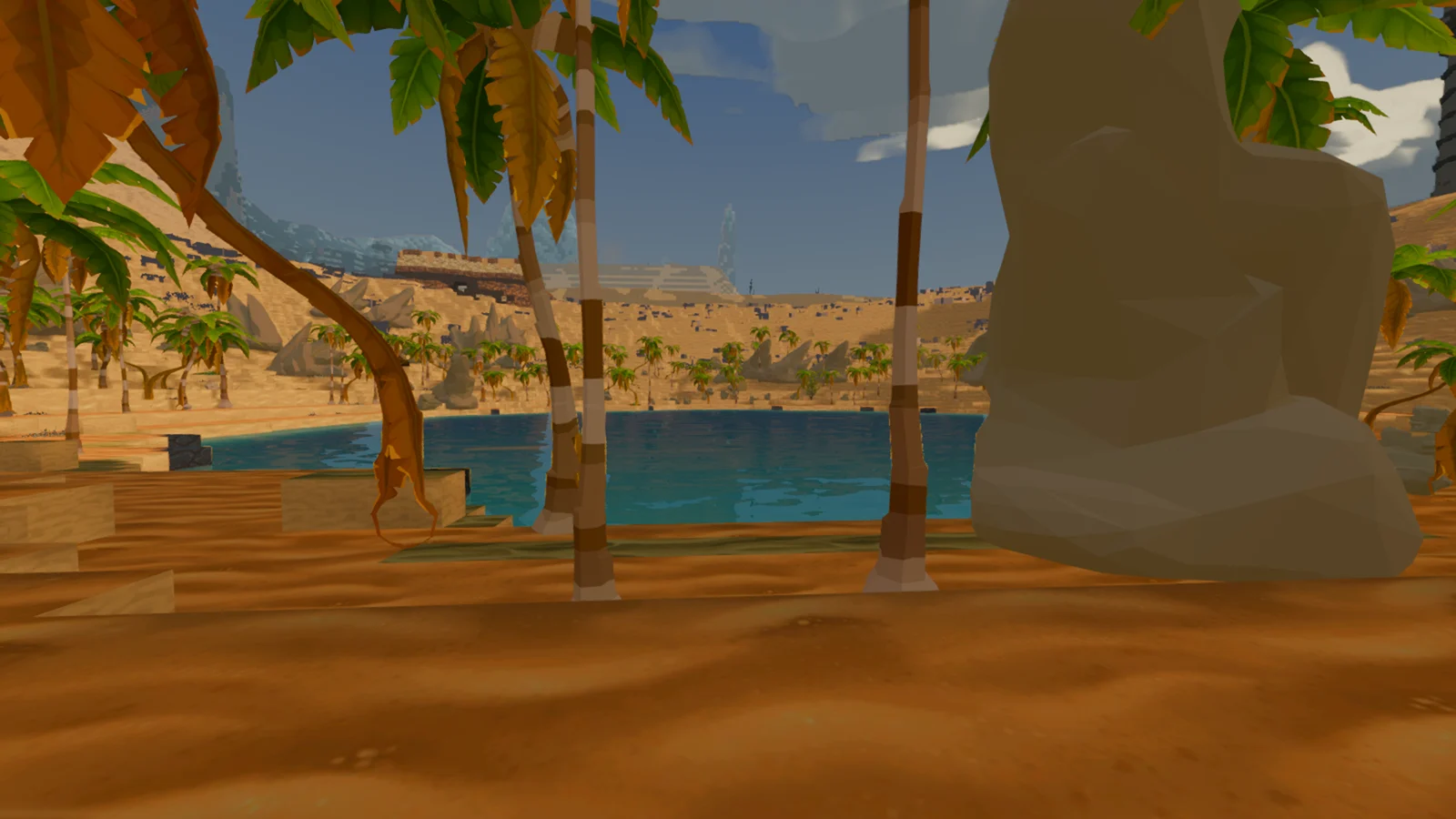 A desert oasis seen through palm trees